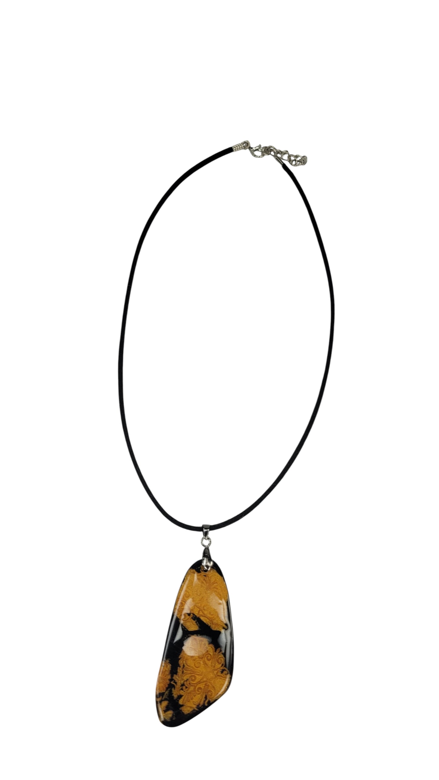 Earthy-metallic-toned striking pendant on black Necklace