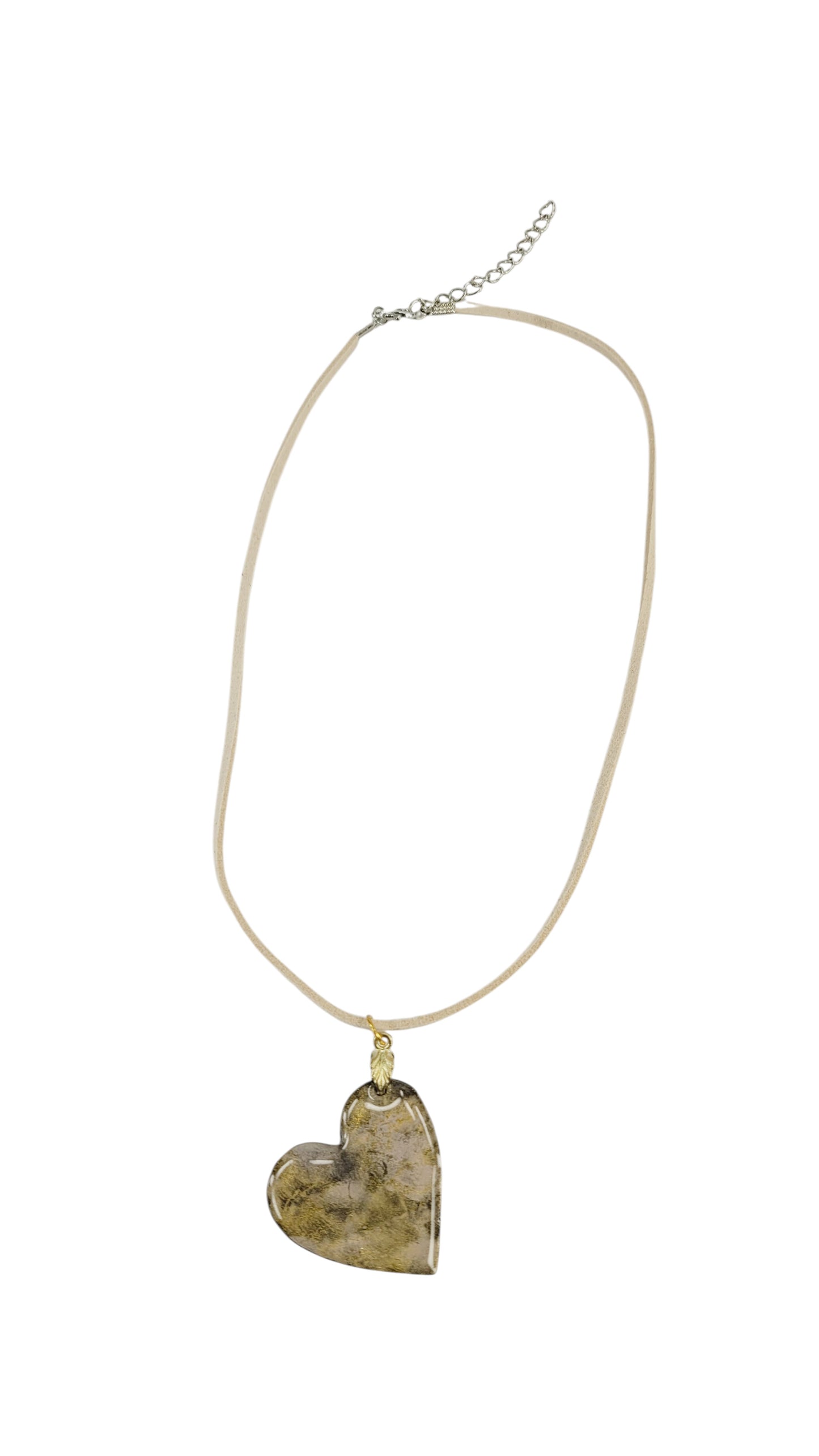 Heart-shaped pendant with soft, earthy tones