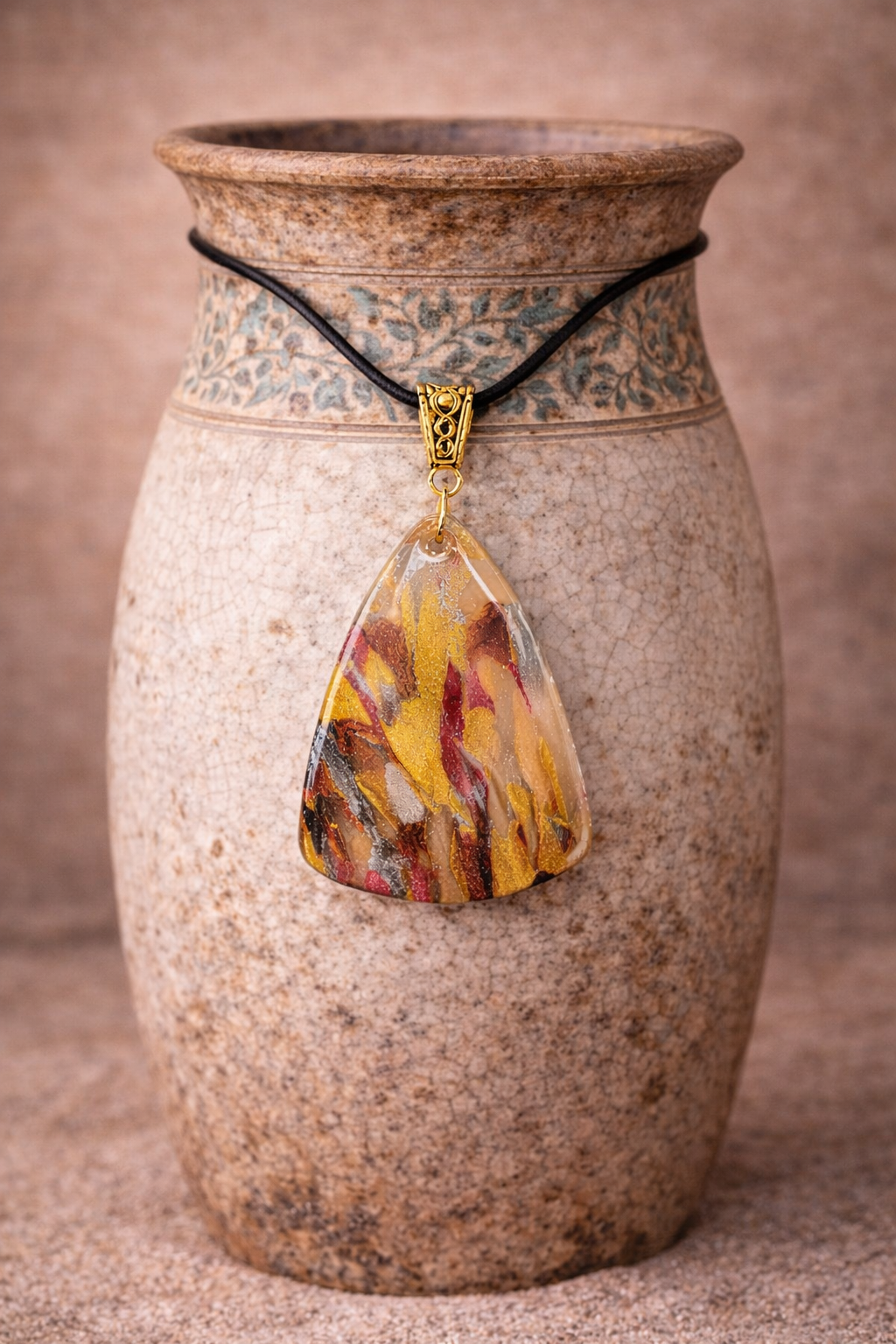 Striking pendant with rich metallic tones Necklace