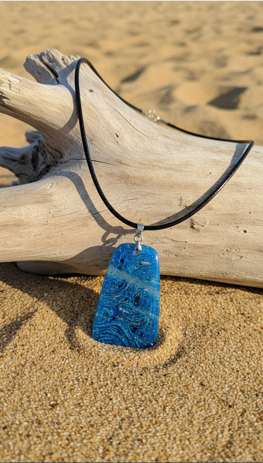 Ocean blue and silver wave-like swirl Necklace