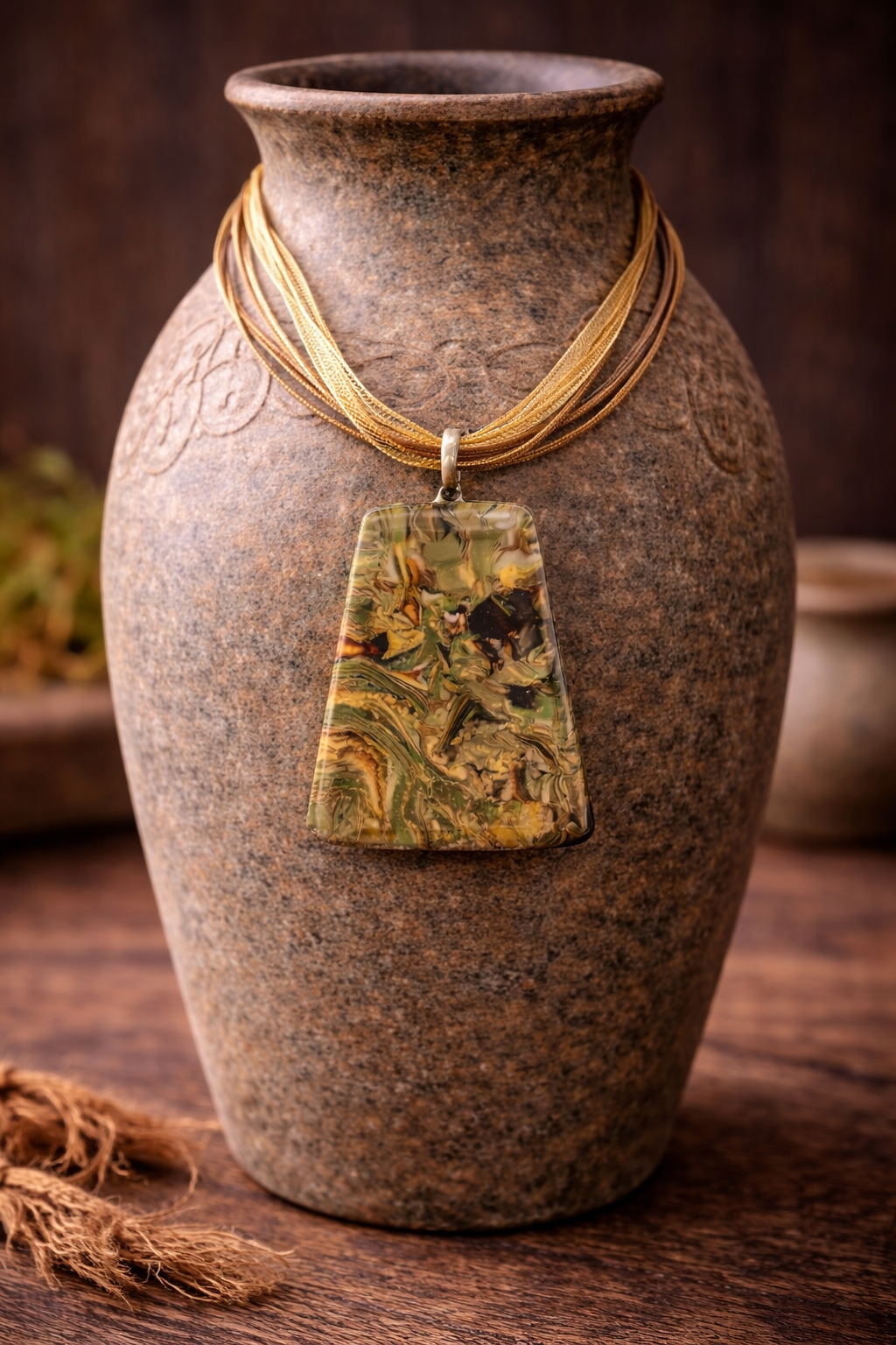 Earthy, grounded design resembles a miniature landscape Necklace