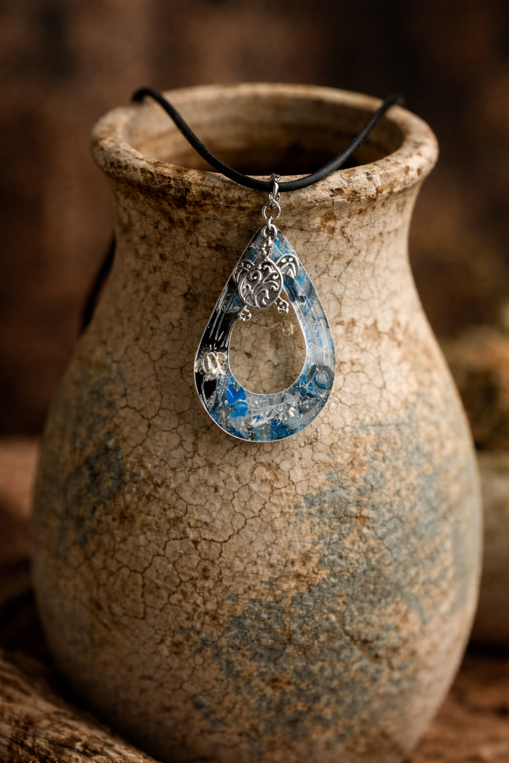 Swirls of blue, white, and silver with turtles Necklace