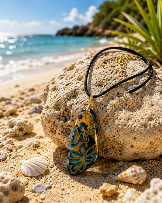 Bold floral-inspired patterns in vivid turquoise blue, warm gold Necklace