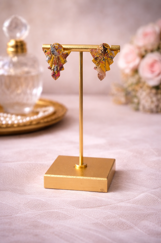 Warm golds, soft amber, and hints of rose Studs