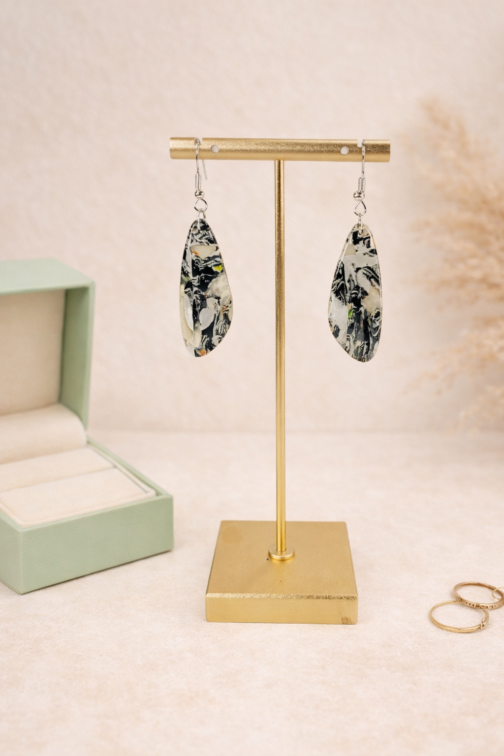Translucent, black, ivory, and muted earthy tones Earrings