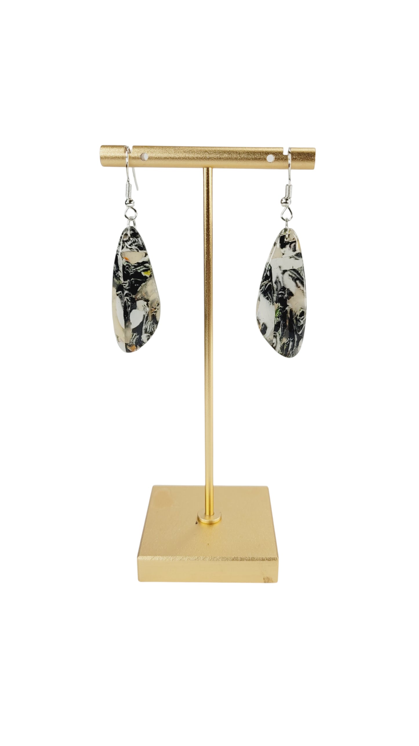 Translucent, black, ivory, and muted earthy tones Earrings