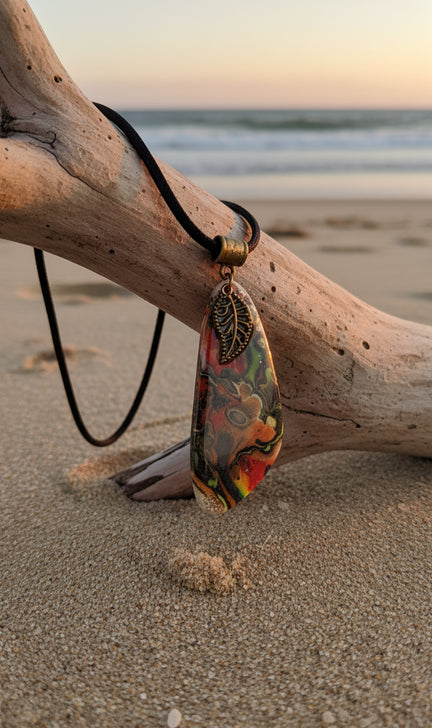 Swirling colors Necklace with leaf charm