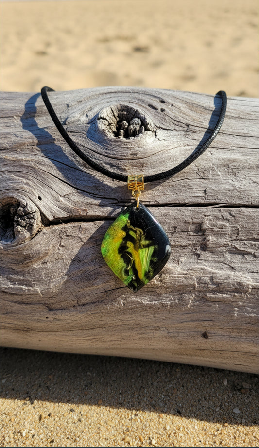 Dramatic backdrop with vibrant ribbons of green and golden Necklace