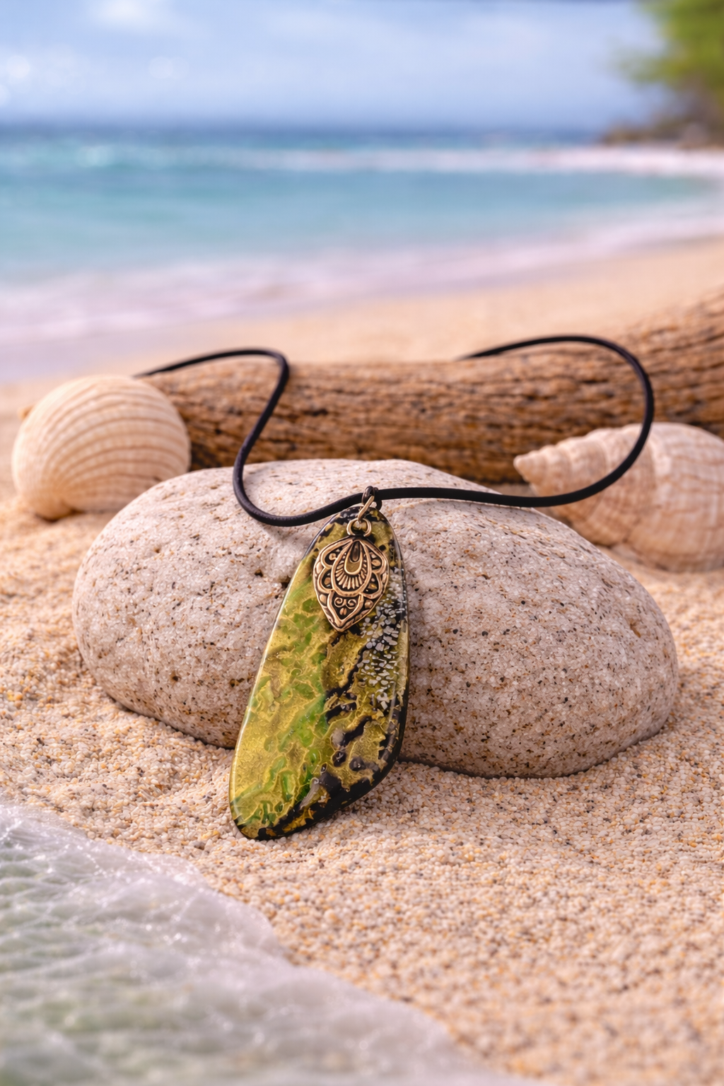 Green, gold, and black pendant with a charm Necklace