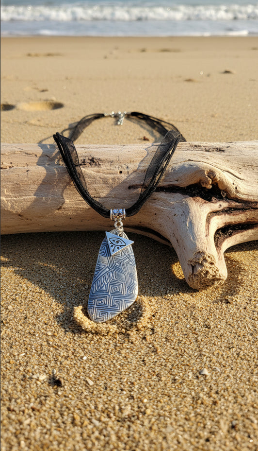 Silver-tone pendant with geometric pattern Necklace