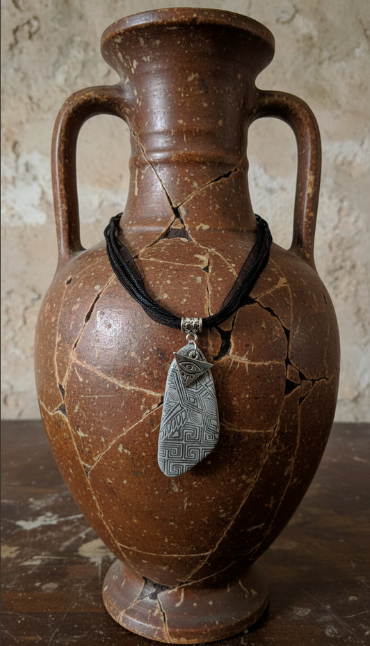 Silver-tone pendant with geometric pattern Necklace