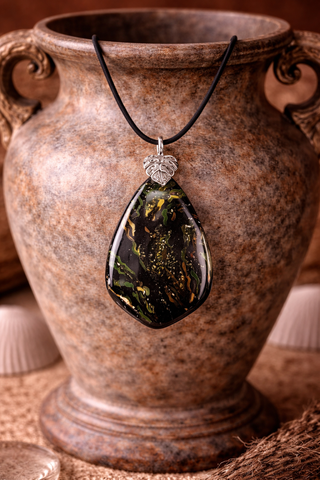 Dark stone, mossy textures, and hints of movement Necklace