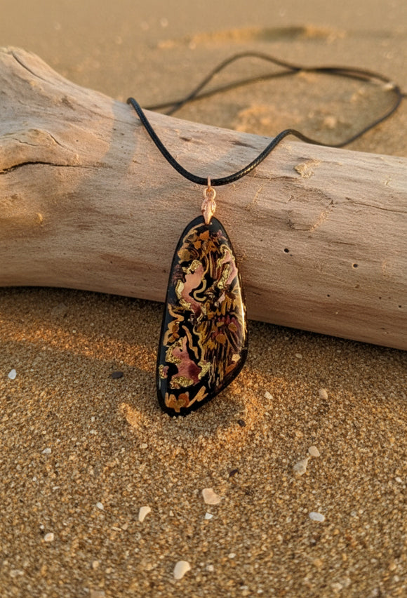 Warm copper and ember tones on black Necklace